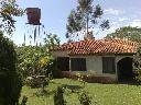Wochenendhaus mit gepflegtem Garten und glasklarem Bachlauf in Piribebuy - Immobilien Paraguay